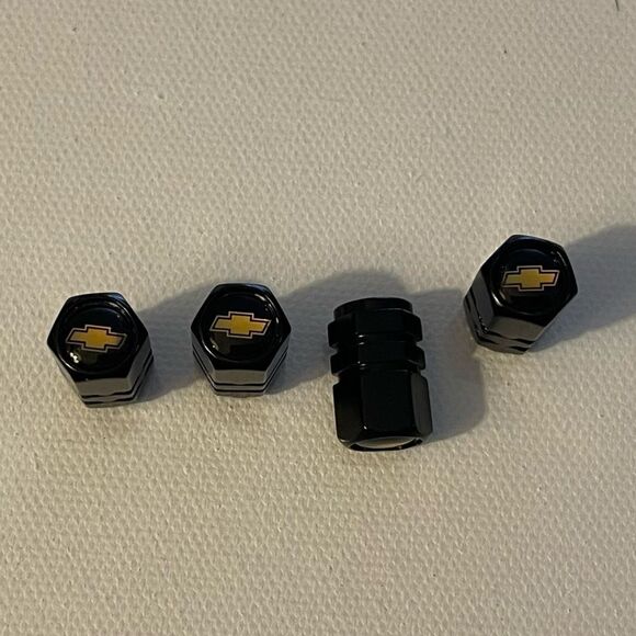 Chevrolet Valve Stem Caps in Black with Logo NWT - Picture 1 of 4